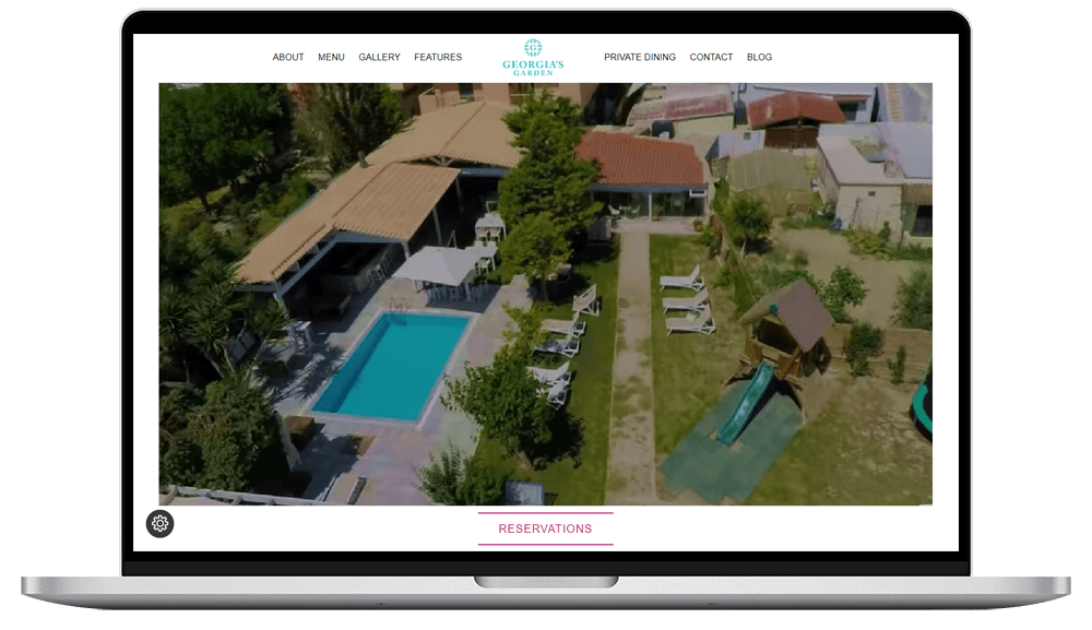 laptop device shows georgia's garden restaurant website
