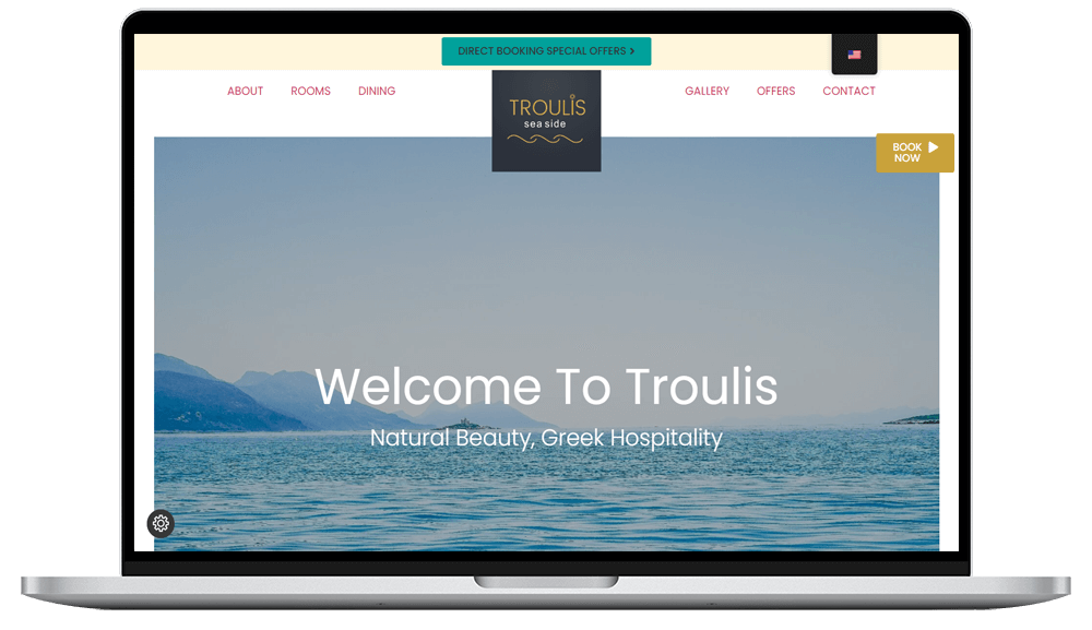 laptop device shows troulis apartments website