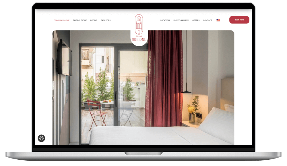 laptop device shows domus ariadne hotel website