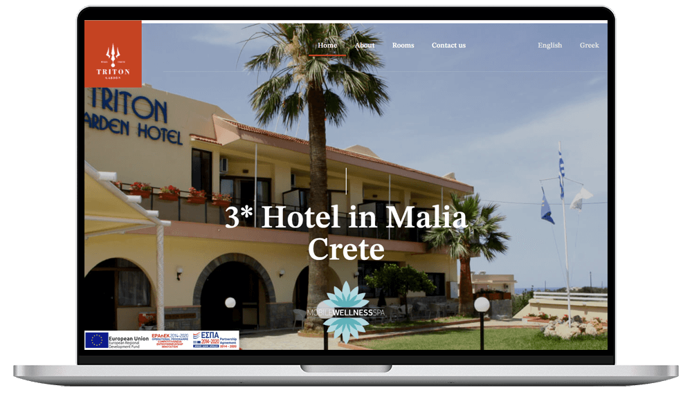 Η συσκευή φορητού υπολογιστή εμφανίζει την ιστοσελίδα του ξενοδοχείου triton garden hotel