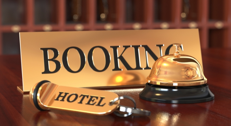 7 ways to get more direct hotel bookings without relying on OTAs. the image shows the words booking ans hotel.