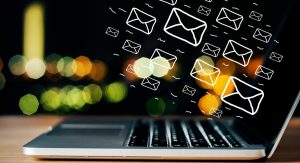 Email marketing that doesn’t go to spam Tips that work in 2025. The image shows a laptop and mails